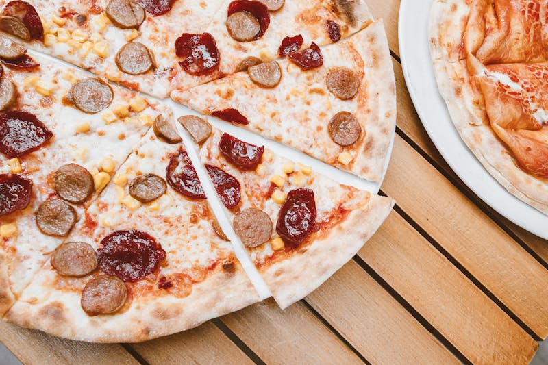 Spicy Arrabbiata punch pizza with hot Italian sausage