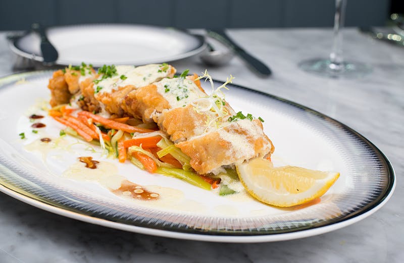 Crispy fried calamari with lemon and aioli dipping sauce